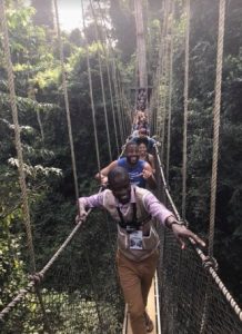 UB MBA students make their way across the 130-foot suspension bridges above the Kakum Rainforest, Ghana