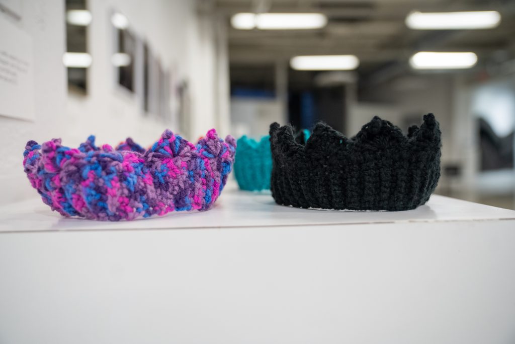 A close up of the crochet crowns, which participants were encouraged to try on and take a selfie with.