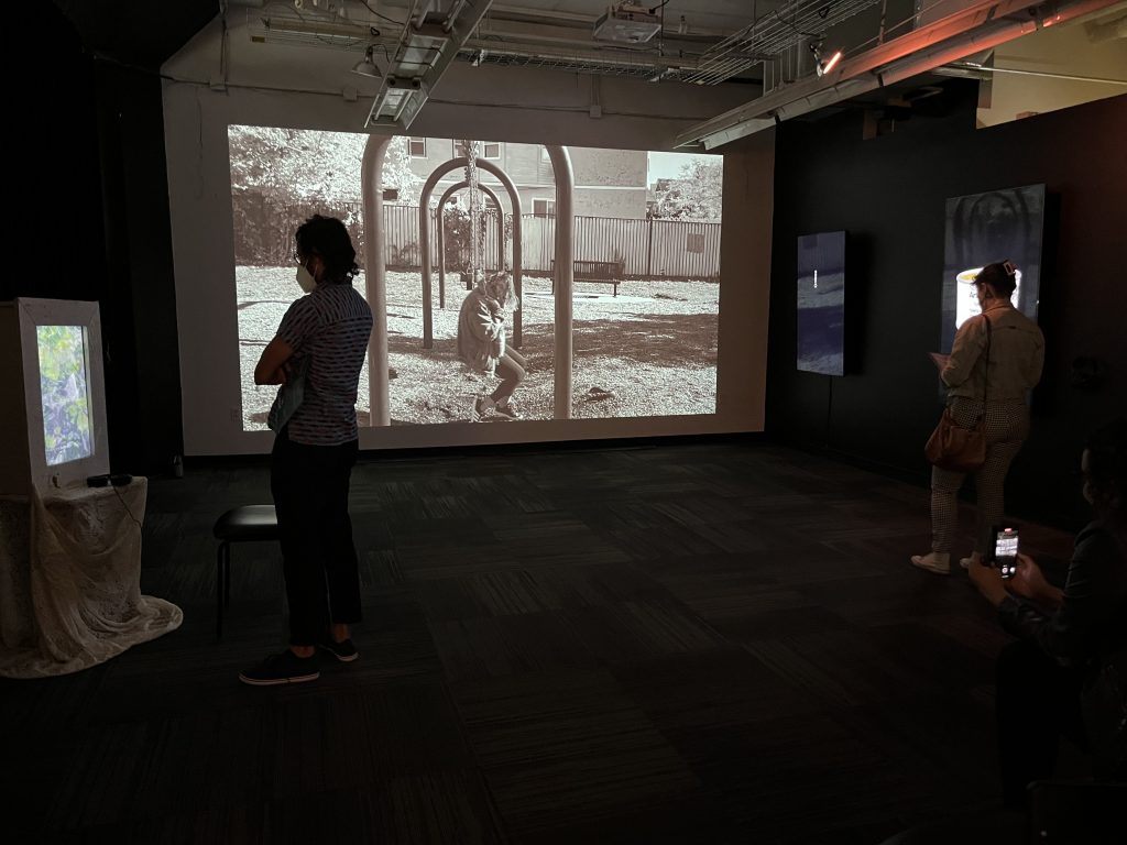 An image of the video and media installations at Squeaky Wheel Film & Media Arts Center.