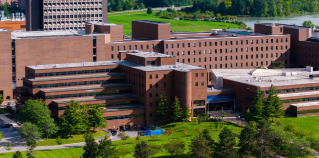 A picture of the building front of the School of Management