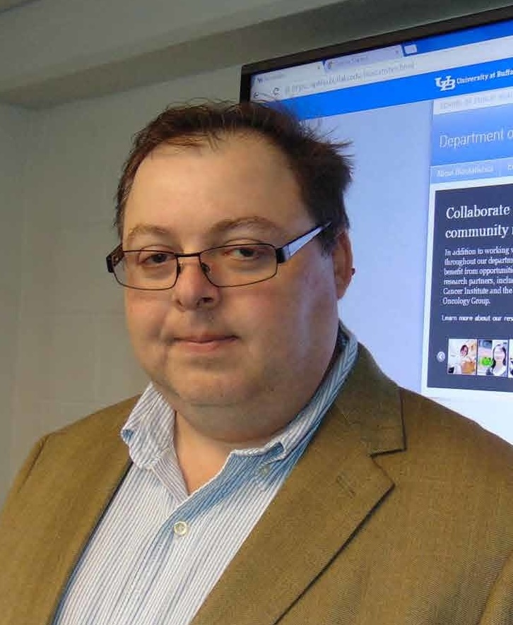 Headshot of Albert Vexler