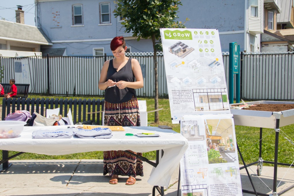 Jenna Bow preparing the booth for the Solar Jam 