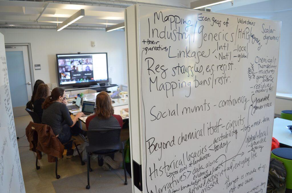 people in a room taking part in a workshop