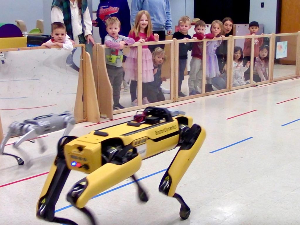 Robot walking around classroom