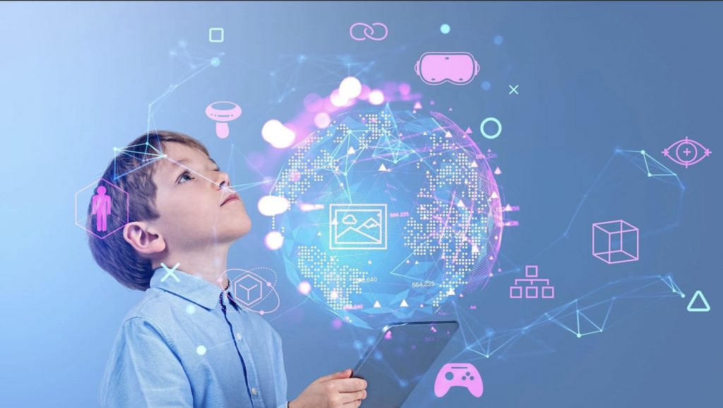 A young boy holding a tablet computer