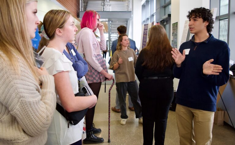 Ismail presenting his poster at the 6th Annual Western New York Undergraduate Psychology Conference