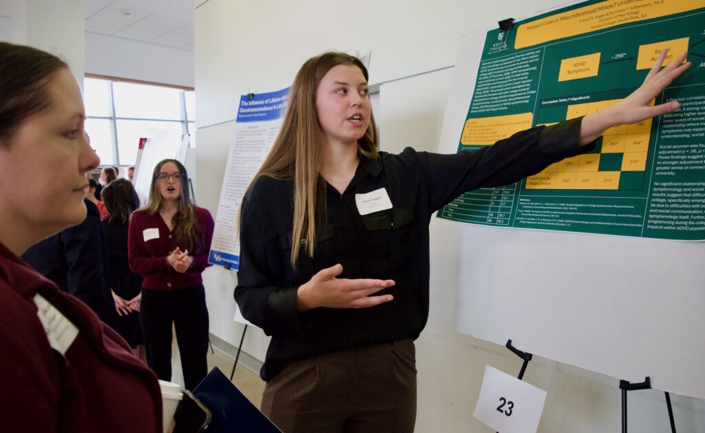 Grace Eagen presenting their poster