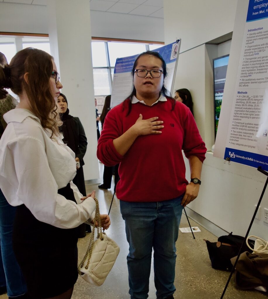 Ivan Mui presenting his poster
