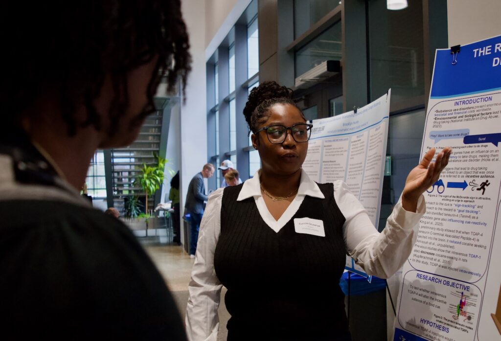 Eunice Olusanya presenting her poster