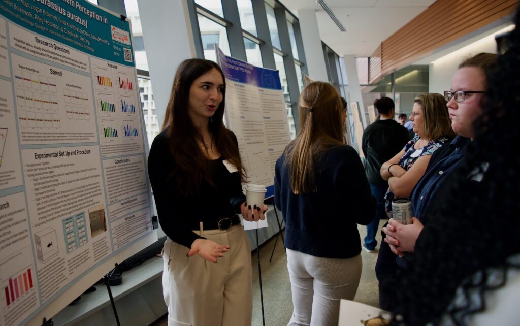 Maya Garaway presenting their poster
