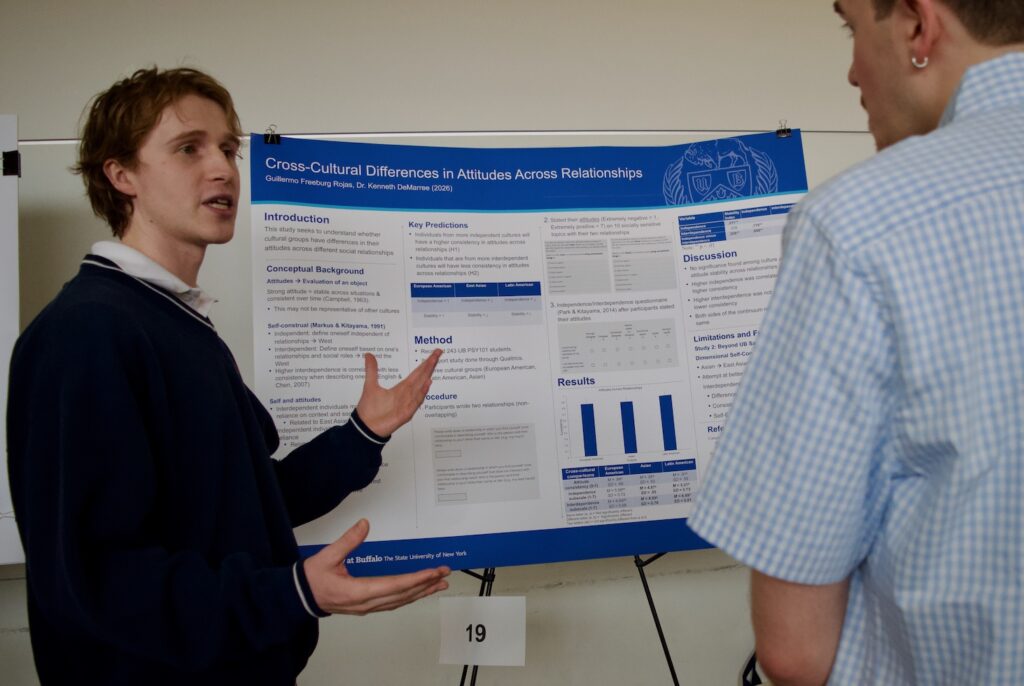 Guillermo Freeburg Rojas presenting his poster